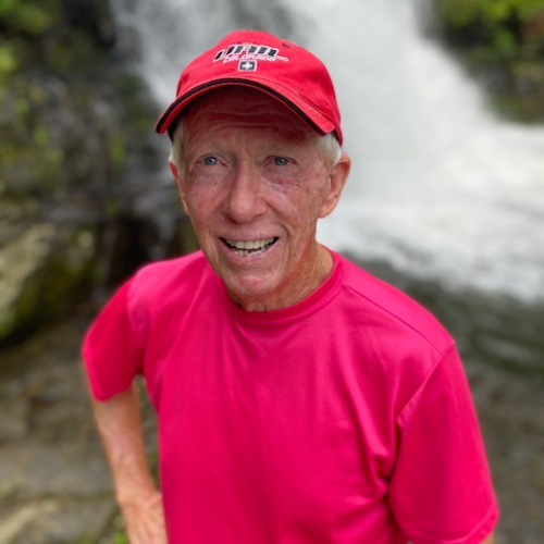 headshot of local author Denny Schlindwein