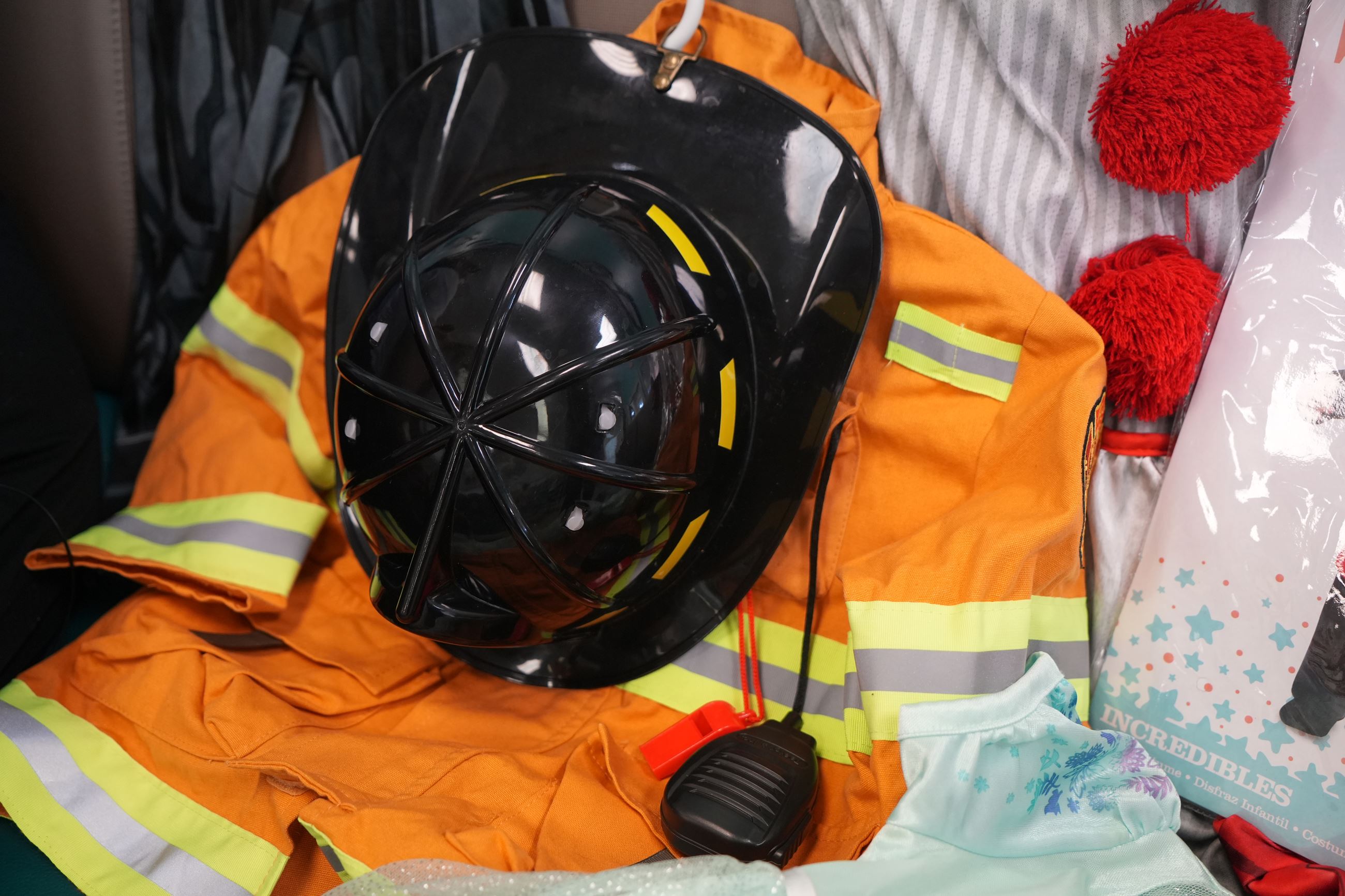Various Children's Costumes, Including a Firefighter