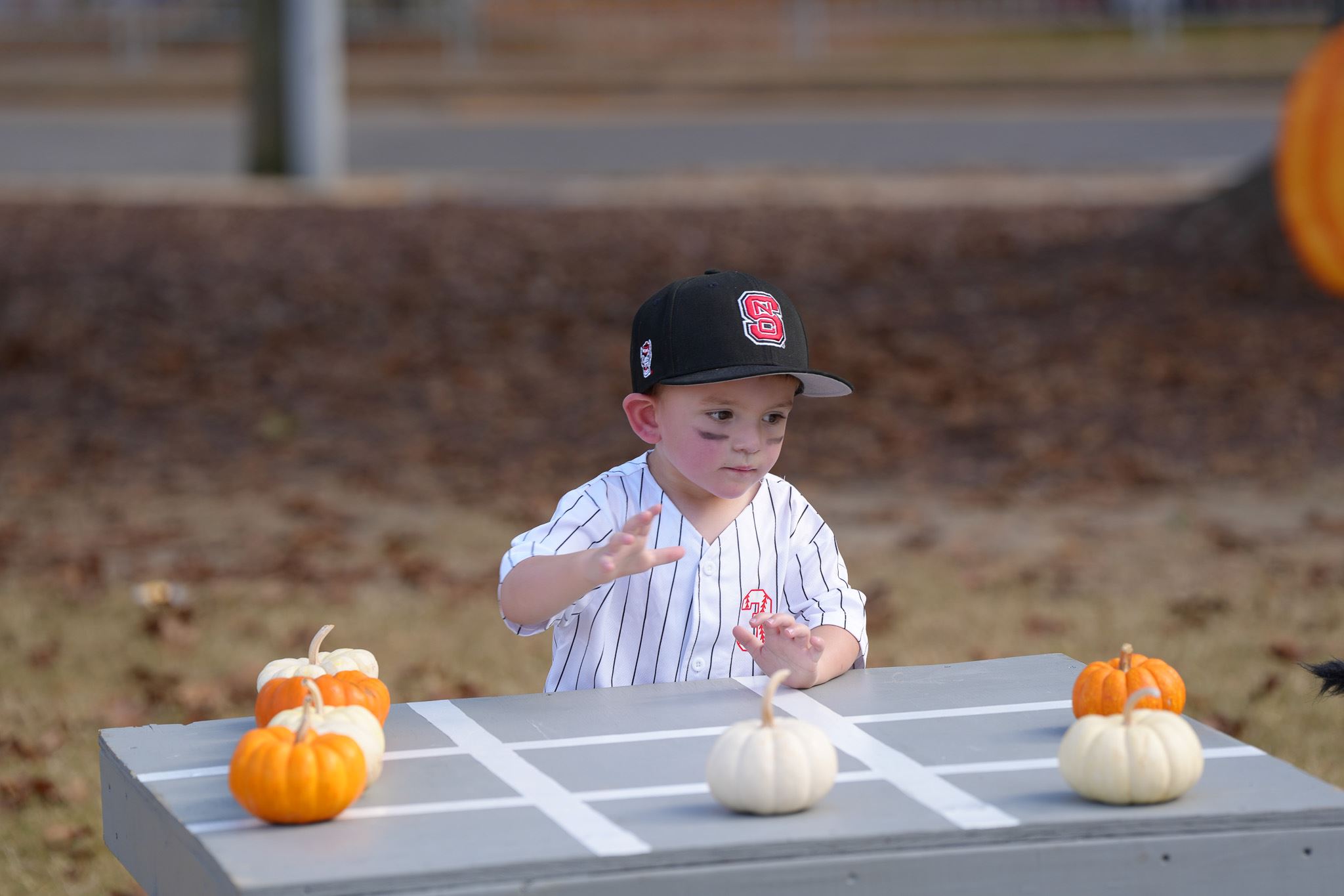 Kids in costumes collect candy during Trick-or-Treat Main Street 