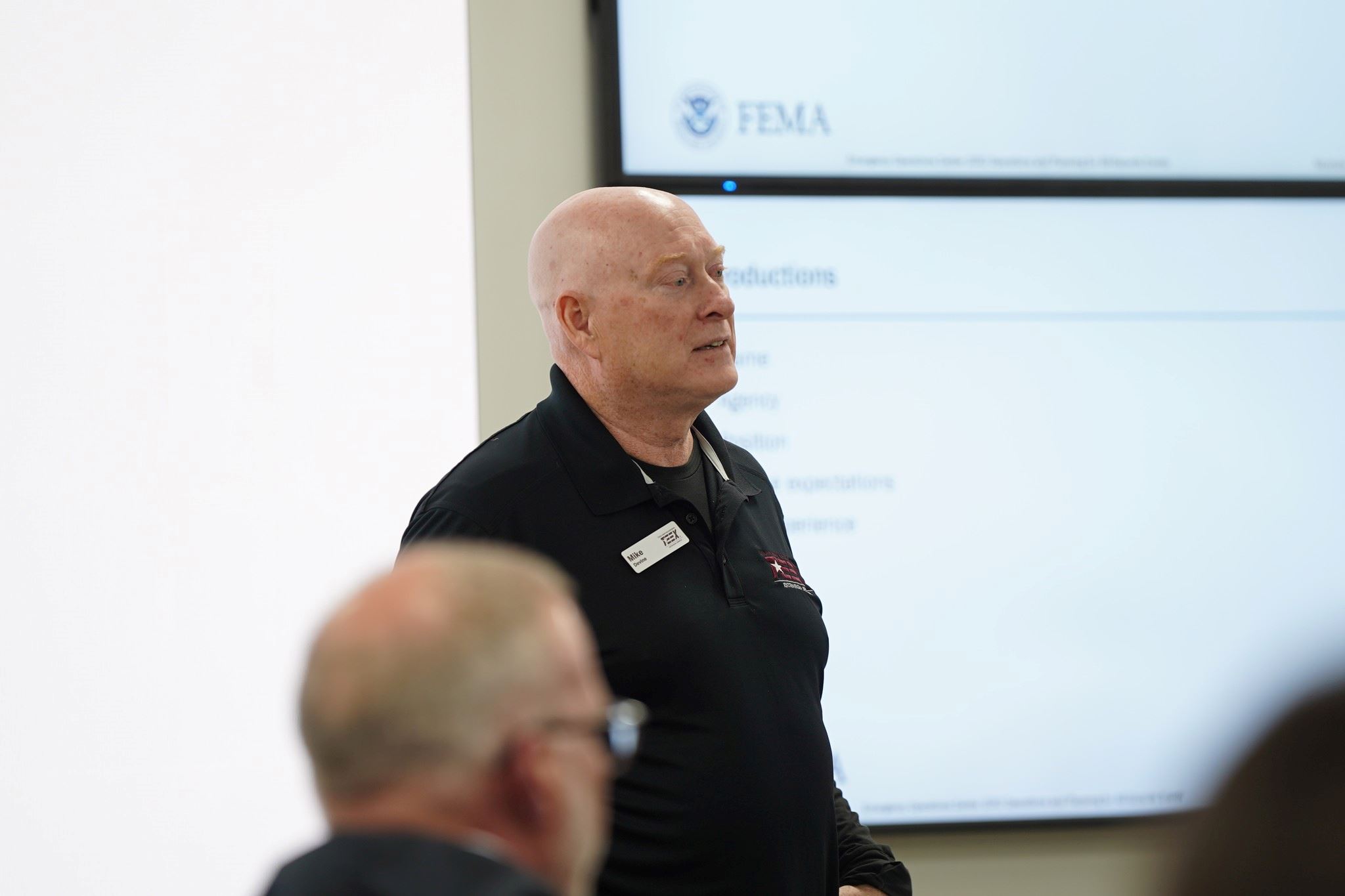 TEEX staff member at front of the room for discussion