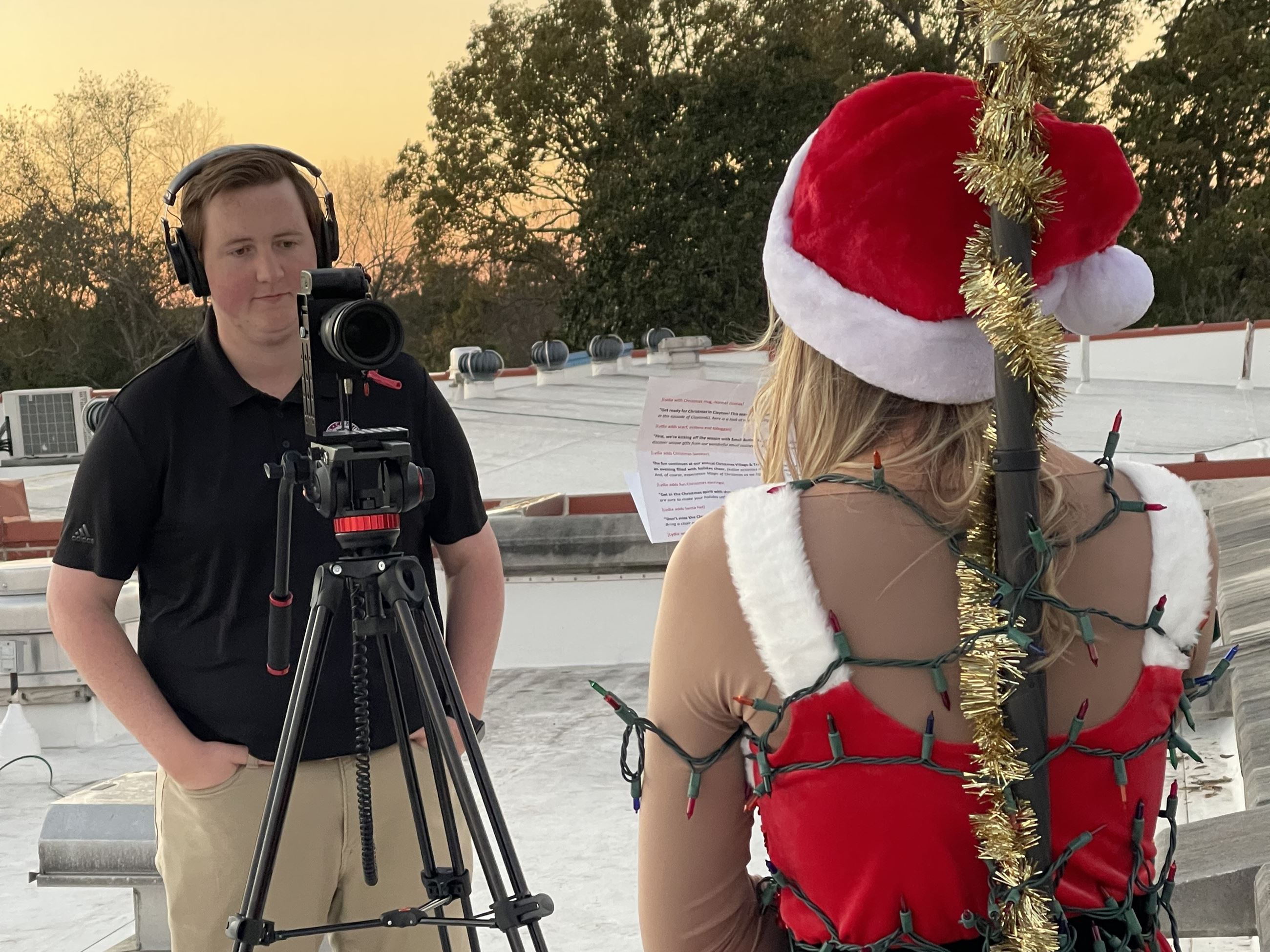 Daniel Bizzell records Clayton4U on Town Hall rooftop