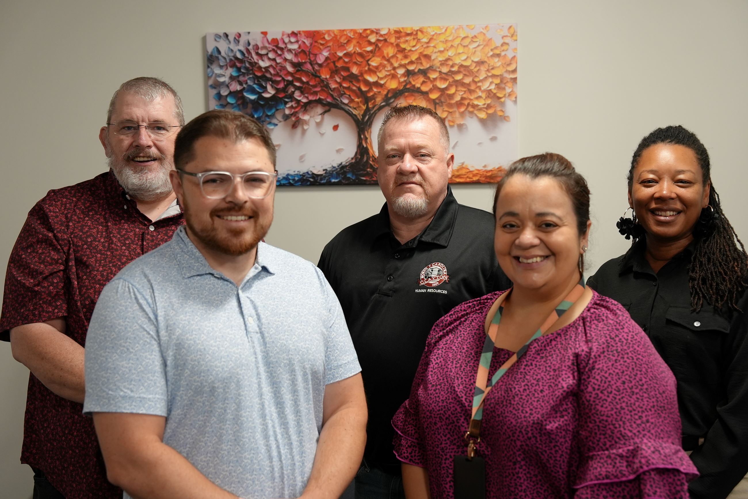 Clayton HR deparment poses for photo